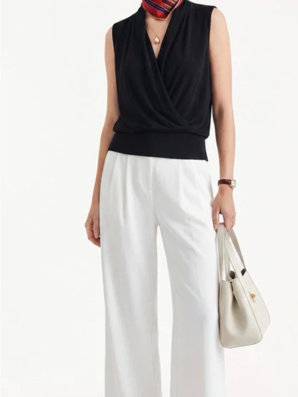 2 Sleeveless Black and Blue Wrap-Front Top for Women from OGL both Mediums